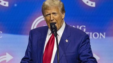 Former US President and Republican presidential candidate Donald Trump speaks during a campaign rally at the Gas South Arena in Duluth, Georgia, on October 23, 2024. 
CHRISTIAN MONTERROSA / AFP