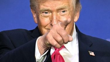 US President Donald Trump gestures during a roundtable discussion on his 