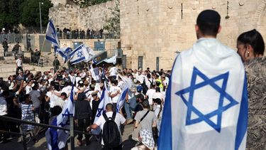 epa12957227 Right-wing Israelis gather for the annual 'Flag March' near the Damascus Gate in the Old City of Jerusalem, 14 May 2026. The march commemorated the establishment of Israeli control over the area following the 1967 Six-Day War.  EPA/ATEF SAFADI