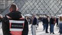A security guard stands in front of the Pyramide du Louvre, designed by Chinese-US architect Ieoh Ming Pei, with the Louvre Museum in the background in Paris on October 22, 2025. The Louvre Museum reopened its doors to visitors on October 22, 2025 morning for the first time since October 19, 2025's spectacular robbery by four criminals, who made off with eight jewels worth an estimated €88 million, an AFP journalist reported.
Thibaud MORITZ / AFP