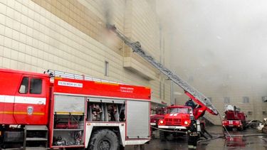 Brand in winkelcentrum: 'nooduitgangen op slot' / AFP