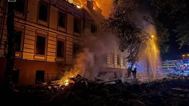 This handout photograph taken and released by Ukrainian State Emergency Service on July 19, 2026 shows a rescuer putting out a fire in a building following Russian missile strikes on the Ukrainian capital of Kyiv, amid the Russian invasion in Ukraine. Russian missiles rocked Ukraine's capital overnight, killing at least one person and wounding five others day after Kyiv launched a deadly wave of drones that pounded e-commerce warehouses in Russia.
Handout / Ukrainian State Emergency Service / AFP