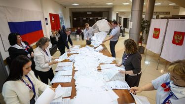 epa13252886 Members of a local electoral commission empty a ballot box to count the ballots at the end of parliamentary elections at a polling station in Podolsk, Moscow region, Russia, 20 September 2026. Voting in the State Duma elections is taking place over three days from 18 to 20 September.  EPA/MAXIM SHIPENKOV