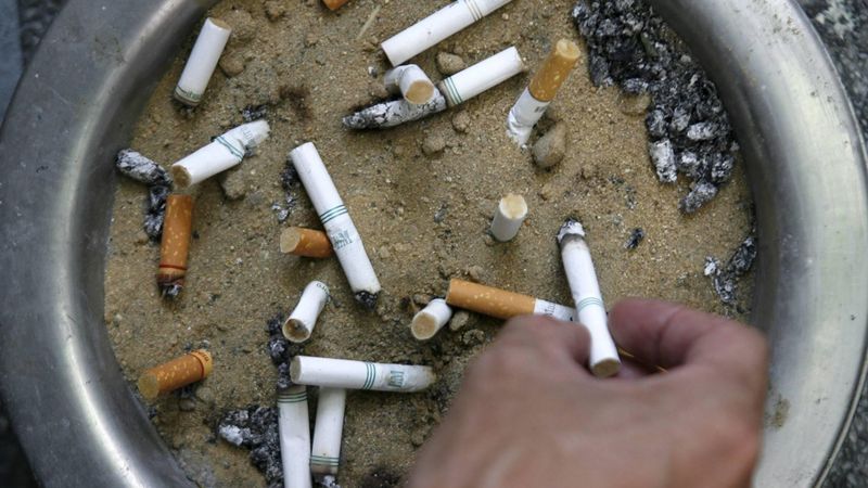 epa01022487 An ashtray full of cigarette butts in a designated smoking area at an office building in Bangkok, Thailand, 29 May 2007. On Thursday 31 May, World No Tobacco Day is held, sponsored annually by the World Health Organization to call attention to the danger of smoking. This year the day is focused on secondhand smoke, promoting 100% smoke-free environments, especially workplaces and public spaces, as the only effective way to protect people everywhere from exposure to second-hand tobacco smoke. Smoking is the second major cause of death in the world. Thai smoker numbers have fallen by nearly 40 percent over the past 20 years and the government is moving further to enforce more severe anti smoking laws. In the United States alone, tobacco is reported to cause one in every five deaths  EPA/BARBARA WALTON