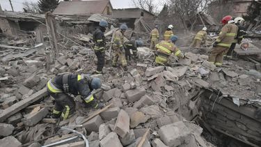 epa11048119 Ukrainian rescuers work among the rubble of a private building after shelling in Zaporizhzhia, southeastern Ukraine, 29 December 2023, amid the Russian invasion. At least 18 people have died and over 130 were injured after Russia launched a wave of airstrikes across Ukraine, Ukraine's Ministry of Internal Affairs said on 29 December. Strikes were reported in Kyiv, Lviv, Odesa, Dnipro, Kharkiv, Zaporizhzhia, and other Ukrainian cities. Russia launched 'more than 150 missiles and combat drones' at Ukrainian cities, Ukraine's Prosecutor General Andriy Kostin said in a statement, adding that extensive damage included residential buildings, educational institutions and hospitals. Russian troops entered Ukraine on 24 February 2022 starting a conflict that has provoked destruction and a humanitarian crisis.  EPA/KATERYNA KLOCHKO