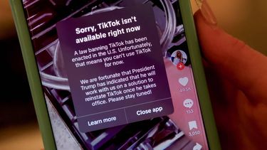 epa11835228 A person holds an iPhone with a message on their TikTok app in Avondale Estates, Georgia, USA, 18 January 2025. The US Supreme Court has backed a law banning the Chinese-owned TikTok app in the United States unless it is sold to a US-based company on 19 January 2025.  EPA/ERIK S. LESSER