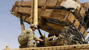 In this US Army handout photo released on June 1, 2026, a US Army air defence artilleryman conducts maintenance on an MIM-104 Patriot missile system, the army's primary terminal-phase anti-ballistic missile system, at an undisclosed location in the Middle East. US President Donald Trump said on June 1 that talks with Iran were moving at a 
