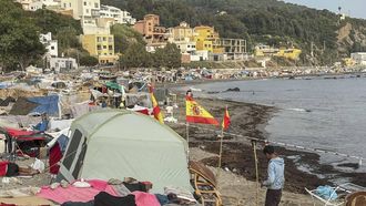 epa13216498 A migrant stands near makeshift tents erected by migrants along Trampolin Beach in Ceuta, Spain, 06 September 2026. Ceuta President Juan Jesus Vivas is expected to meet European Commissioners Magnus Brunner and Dubravka Suica and European Parliament President Roberta Metsola in Brussels on 08 September to discuss the migration crisis. Thousands of people crossed from Morocco into the Spanish North African enclave in late July 2026.  EPA/REDUAN