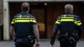 DEN HAAG - Twee politieagenten arriveren bij de Adventkerk voor een herdenkingsbijeenkomst om stil te staan bij de gevolgen van de explosies aan de Tarwekamp. Bij de explosies zijn zes mensen omgekomen. ANP JOSH WALET