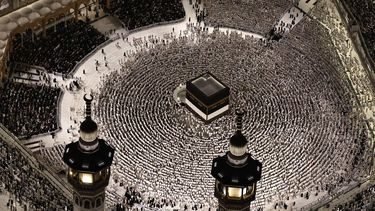 This aerial view shows the Grand Mosque complex in Mecca, as Muslims perform the evening prayer around the Kaaba, Islam's holiest shrine, on May 24, 2026, ahead of the annual Hajj pilgrimage. Over 1.5 million pilgrims have arrived in Saudi Arabia from outside the kingdom for the upcoming hajj, according to a Saudi official, exceeding the number of international visitors last year despite the war in the Middle East.
Zain JAAFAR / AFP
