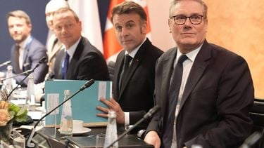 Britain's Prime Minister Keir Starmer (R) attends a trilateral meeting with French President Emmanuel Macron (C) and German Chancellor Friedrich Merz (not pictured) during the Munich Security Conference in Germany on February 13, 2026. 
Stefan Rousseau / POOL / AFP