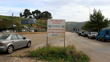 A photograph taken near the UN Interim Force in Lebanon (UNIFIL) sign by the Litani River and the Qasmiyeh Bridge, on a main highway linking villages in the Tyre district with others further north, showing the bridge destroyed in an Israeli airstrike in southern Lebanon, on March 23, 2026.  The Lebanese president on March 22, 2026, slammed Israeli strikes on bridges and other infrastructure in the country's south, calling such attacks a 