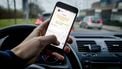 appen achter het stuur smartphone