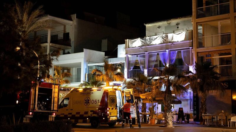 Emergency vehicles are seen after a two-storey restaurant collapsed, killing four and injuring at least 17 people on Playa de Palma, south of the Spanish Mediterranean island's capital Palma de Mallorca, on May 23, 2024.  Four people died and 17 were injured after the roof of a two-storey restaurant collapsed on Spain's Mediterranean island of Mallorca on May 23, 2024, AFP reported.
Jaime REINA / AFP