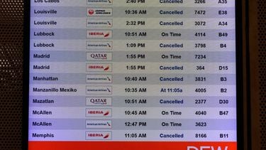 epa12678168 A view of the flight information screens displaying cancelled flight information at DFW Airport Terminal D during a winter storm in Dallas, Texas, USA, 24 January 2026. A winter storm and extreme cold watches have been issued, with cold, snow and sleet expected in North Texas.  EPA/JEROME MIRON