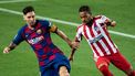Een foto van Messi in actie tegen Atlético Madrid