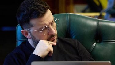 This handout photograph taken and released by the Ukrainian Presidential Press Service on November 21, 2025 shows Ukraine's President Volodymyr Zelensky listening during a phone call with French president, British Prime Minister and German Chancellor while sitting at his office in Kyiv. The leaders of Germany, France, Britain and Ukraine on November 21, 2025 stressed the need to safeguard 