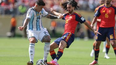 Argentina's midfielder #24 Enzo Fernandez and Spain's defender #24 Marc Cucurella fight for the ball during the 2026 World Cup football tournament final match between Spain and Argentina at the New York/New Jersey Stadium in East Rutherford on July 19, 2026. 

PATRICIA DE MELO MOREIRA / AFP