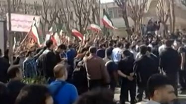 This video grab taken from UGC images posted on social media and verified by AFPTV teams in Paris on February 21, 2026, shows Iranians clashing near the Department of Aerospace Engineering of Sharif University in Tehran.  As some repeat 