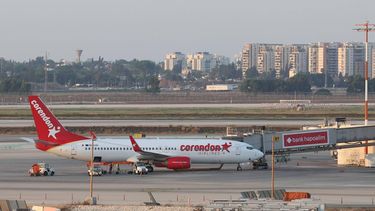 epa11565718 A Corendon aircraft at Ben Gurion International airport in Tel Aviv, Israel, 26 August 2024. Many international airlines have cancelled or delayed flights to Israel after the Israeli military stated that Israeli Air Force fighter jets struck targets belonging to the Hezbollah organization that posed an imminent threat to the citizens of the State of Israel. Hezbollah stated that it had fired more than 300 missiles and drones at Israel.  EPA/ABIR SULTAN