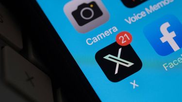 This photo illustration shows the X logo (formerly Twitter) on a smartphone screen in Los Angeles, California, on July 31, 2023. San Francisco sent the company formerly known as Twitter a warning on July 31, 2023, that it needed proper permits for the giant, flashing new X sign atop its headquarters, after the tech firm twice refused to let building inspectors check it.
Chris Delmas / AFP