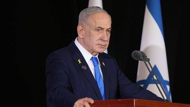 Israeli Prime Minister Benjamin Netanyahu participates in a state memorial ceremony for the fallen soldiers of the two-year Gaza war at the Mount Herzl military cemetery in Jerusalem on October 16, 2025. Netanyahu said on October 16, that he was determined to ensure that Hamas hands back the remains of hostages still in Gaza, adding that the fight 