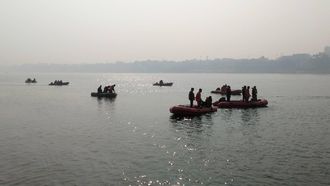 Indian rescue workers search for victims of a boat accident on the river Ganges near Patna on January 15, 2017. The death toll from a boat accident in eastern India rose to 26 on January 15, a senior official said, warning of more casualties with rescue workers still scouring the waters.

AFP