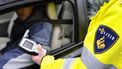 Een automobilist wordt staande gehouden voor een alcoholcontrole. Foto: ANP / Lex van Lieshout