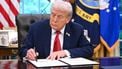 US President Donald Trump signs an executive order in the Oval Office of the White House in Washington, DC, on September 25, 2025.  
SAUL LOEB / AFP