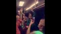 Screenshot van het filmpje, studenten van Vindicat feesten in een bus.