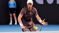 Britain's Andy Murray hits a return during his men's doubles match with partner Holger Rune of Denmark against Russian duo Aslan Karatsev and Roman Safiullin at the Brisbane International tennis tournament in Brisbane on December 31, 2023. 
William WEST / AFP