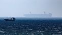 epa12194517 A ship sails in the Strait of Hormuz as seen from Khasab, Musandam Governorate, Oman, 24 June 2025. The Iranian parliament approved a measure to close the Strait of Hormuz following US strikes on three of Iran's key nuclear sites on 22 June 2025. Israel and Iran have been exchanging fire since Israel launched strikes across Iran on 13 June 2025.  EPA/ALI HAIDER