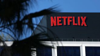 The Netflix logo is pictured at the company’s Hollywood studio offices at Sunset Bronson Studios in Los Angeles, California on December 5, 2025. Streaming giant Netflix said December 5, 2025 it will buy film and television studio Warner Bros. Discovery for nearly $83 billion, the entertainment industry's biggest consolidation deal this decade. The acquisition gives Netflix access to a vast film catalog as well as the prestigious streaming service HBO Max.

Patrick T. Fallon / AFP