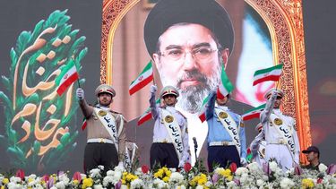 epaselect epa12921947 Iran Army members wave national flags as they stand in front of a poster of Iranian Supreme Leader Ayatollah Mojtaba Khamenei during a rally in Tehran, Iran, 29 April 2026. The demonstration, organized to show support and solidarity for the new leadership, follows an announcement by US President Trump on 21 April, that the ceasefire between the United States and Iran has been extended indefinitely at the request of Pakistan, as a naval blockade remains in place and diplomatic negotiations continue.  EPA/ABEDIN TAHERKENAREH