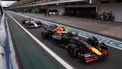 Red Bull Racing's Dutch driver Max Verstappen (R) and Haas F1 Team's French driver Esteban Ocon (L) line up in the pit lane ahead of the Sao Paulo Formula One Grand Prix at the Jose Carlos Pace racetrack, aka Interlagos, in Sao Paulo, Brazil on November 9, 2025. 
JEAN CARNIEL / POOL / AFP