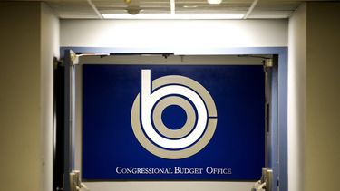 epa05846237 A sign identifies the offices of the nonpartisan Congressional Budget Office (CBO), which will soon release the projected cost and effect of the Republican bill, called the American Health Care Act, to replace Obamacare in the Ford House Office Building in Washington, DC, USA, 13 March 2017. Many congressional Republicans, as well as members of the Trump administration, are dismissing the report before it is released, concerned that it will disclose that many Americans will lose their health insurance under the Republican replacement plan.  EPA/JIM LO SCALZO
