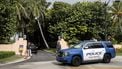 epa10112632 Authorities stand outside Mar-a-Lago, the residence of former president Donald Trump, amid reports of the FBI executing a search warrant as a part of a document investigation, in Palm Beach, Florida, USA, 09 August 2022.  EPA/CRISTOBAL HERRERA-ULASHKEVICH