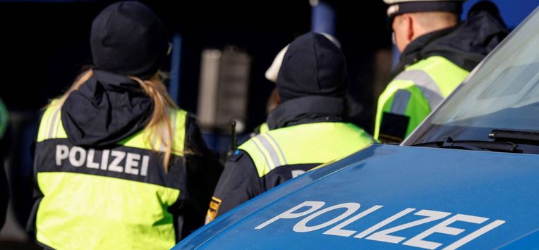 The lettering 'Polizei' (police) is seen on the bonnet of a police vehicle as German police officers control cars at a border control station between Oberaudorf (Germany) and Niederndorf (Austria), southern Germany on February 6, 2025. 
Michaela STACHE / AFP