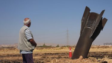 A Syrian farmer looks at an Iranian missile that fell into an agricultural land in the area of Najha, in the countryside of the Syrian capital after being intercepted by Israeli air defense systems on June 8, 2026.  Iraq and Syria closed their airspace as a safety precaution on June 7 after their eastern neighbour Iran launched missiles across their territory towards targets in Israel. In a brief statement, the Iraqi Civil Aviation Authority reported the closure of Iraqi airspace for 72 hours. Syria's authority closed the country's 