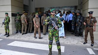 Security personnel stand guard outside Colombo High Court after escorting the accused involved in Sri Lanka's Easter Sunday attacks of 2019, during the verdict in the trial in Colombo on September 22, 2026. Sri Lanka is set to conclude on September 22 the trial of 24 men accused of plotting the 2019 Easter Sunday bombings, the deadliest attack against civilians in the island's history. Suicide bombers struck three luxury hotels and three churches on April 21, 2019, killing 279 people, including 45 foreigners.
Ishara S. KODIKARA / AFP
