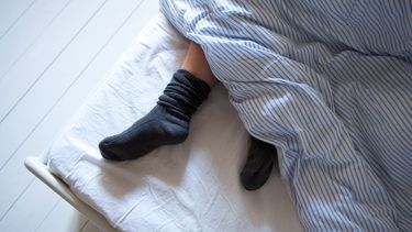 Lekker met sokken aan in bed, is dat wel zo verstandig?