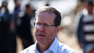 Israel’s President Isaac Herzog speaks to the media as he visits an area hit by a reported overnight Iranian strike in Tel Aviv on March 1, 2026. Ayatollah Ali Khamenei, Iran's supreme leader since 1989 and sworn enemy of the West, was killed in the opening salvo of a massive US and Israeli attack, sparking a new wave of retaliatory missile strikes from Tehran on March 1.
Ilia YEFIMOVICH / AFP