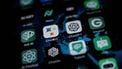 This illustration picture shows icons of Google's AI (Artificial Intelligence) app BardAI (or ChatBot) (C-L), OpenAI's app ChatGPT (C-R) and other AI apps on a smartphone screen in Oslo, on July 12, 2023. 
OLIVIER MORIN / AFP