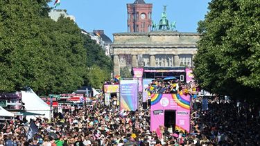 Participants march near the Brandenburg Gate during the Christopher Street Day (CSD) parade in Berlin on July 25, 2026. During this year's CSD parade, taking place under the slogan 'Taking a stand is Hot', various groups demonstrate in support of diversity, human rights, and the protection of minorities.
RALF HIRSCHBERGER / AFP