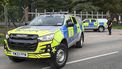 Armed police are posted manning a roadblock at an entrance to RAF Fairford base in Fairford, south-west England on September 27, 2026, as UK counter-terrorism police investigate an incident near the base in the village of Whelford. British police on September 27 declared a major incident and evacuated villagers living near a base used by the US air force after arresting several men on suspicion of explosives offences.
JUSTIN TALLIS / AFP