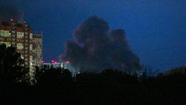Smoke from an explosion among multi-storey residential buildings rises during Russian drones and missiles strikes in Kyiv on May 14, 2026, amid the Russian invasion in Ukraine. Ukraine's capital came under heavy aerial attack early on May 14, an AFP journalist reported, as Kyiv's mayor said Russia was striking the city.
Sergei SUPINSKY / AFP