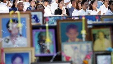 epa11793624 Family members chant next to photographs of tsunami victims during a religious memorial service to commemorate the 20th anniversary of the 2004 tsunami at Tsunami Memorial Park in Ban Nam Khem, Phang Nga province, southern Thailand, 26 December 2024. Thailand commemorates the 20th anniversary of the 2004 Indian Ocean tsunami, which struck on 26 December 2004, triggered by a 9.2 magnitude earthquake in the Indian Ocean off the west coast of northern Sumatra, Indonesia. The tsunami claimed over 220,000 lives, internally displaced more than half a million people, and left hundreds of thousands without livelihoods, according to the United Nations, making it one of the deadliest natural disasters in history. Indonesia, Sri Lanka, India, the Maldives, and Thailand sustained massive damage from the catastrophe.  EPA/RUNGROJ YONGRIT