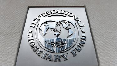 An exterior view of the building of the International Monetary Fund (IMF), with the IMG logo, is seen on March 27, 2020 in Washington, DC.  The coronavirus pandemic has driven the global economy into a downturn that will require massive funding to help developing nations, IMF chief Kristalina Georgieva said on March 27, 2020.
Olivier DOULIERY / AFP