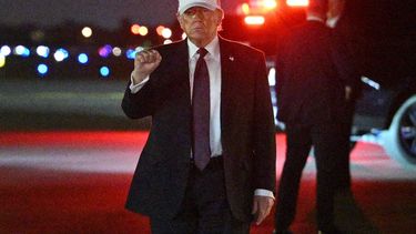 US President Donald Trump makes a fist after he steps off Air Force One upon arrival at Palm Beach International Airport in West Palm Beach, Florida on February 27, 2026. Trump is spending the weekend at his Mar-a-Lago resort.
Mandel NGAN / AFP