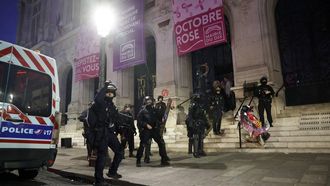 French police officers stand guard to protect Paris' 10th district municipality during a demonstration against the "high cost of living", in Paris on October 17, 2026 as part of a nationwide call for mobilisation bringing together various groups expressing their anger: former "Yellow Vests", secondary school and university students, climate activists and even farmers. After weeks of student protests, France faces broader, nationwide demonstrations on October 17, 2026 over the cost of living, setting up a potentially fraught six months heading into a presidential election. A police source told AFP that authorities estimated nearly 200,000 people could take part, with 40,000 in Paris.
GEOFFROY VAN DER HASSELT / AFP